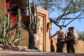 Nancy Guthrie's family visits tribute outside her home as sheriff says investigators are getting 'closer'