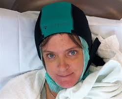 Breast cancer patient Heather Millar is one of a handful of patients in the U.S. so far to try the &quot;DigniCap,&quot; that circulates a cooling gel that chills ... - 101215-chemo-cap-hmed-1p.grid-6x2