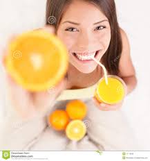 Orange juice drinking woman - orange-juice-drinking-woman-17719593