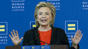 Image result for hillary clinton with gaddafi son