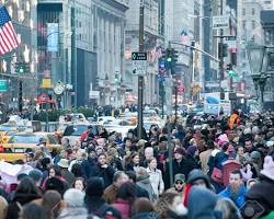 Image of City street crowded with people