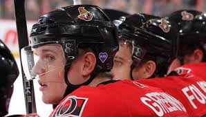Nobody had to tell Colin Greening about the exclusive group he joined by suiting up for the Ottawa Senators ... - Colin_Greening_OttawaBench_2011