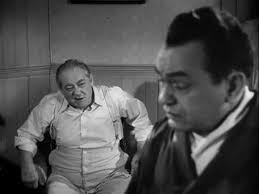 Description: Lionel Barrymore as wheel-chair-bound James Temple denounces gangster Johnny Rocco (Edward G. Robinson) in the motion picture Key Largo (1948). - key-largo-barrymore-robinson