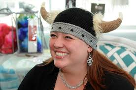 Alyson Cole Basehore smiles Wednesday while wearing a Wurstfest hat she made for her husband. - 5075d2c4034f4.image