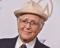 Image of Norman Lear with his Emmys
