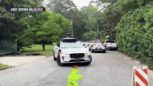 Driverless Waymo taxis over-run Atlanta neighborhood