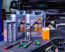 car engine with Liqui Moly 5W30 being poured resmi