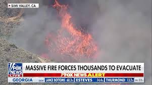Fast-moving California brush fire scorches hundreds of acres