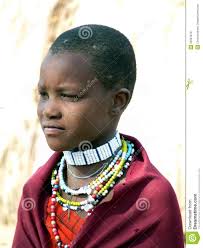 Editorial. Editorial image. Not to be used in commercial designs and/or advertisements. Click here for terms and conditions. - young-masai-girl-traditional-dress-jewellery-village-near-ngorogoro-crater-tanzania-th-september-unidentified-wearing-red-39387879