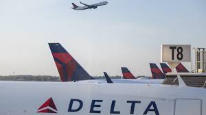 Video shows passenger attempting to open door of taxiing Delta plane