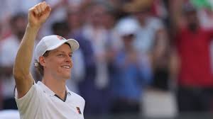 Jannik Sinner celebrates his victory over Novak Djokovic