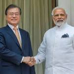 Narendra Modi Moon Jae-in hold