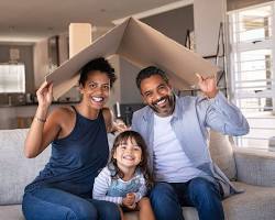 Image of happy family living in a HUD apartment