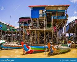 Image of Kampong Phluk Floating Village, Siem Reap, Cambodia, with colorful houses on stilts