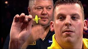 Watch the final leg as Dave Chisnall causes the first big shock of the BDO World Professional Darts by dumping out fourth seed Darryl Fitton. - _47026106_fittonout512