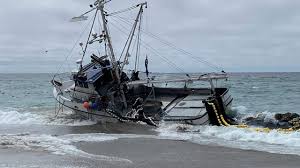 Massive fishing boat runs aground at popular beach with 1,000 gallons of diesel on board