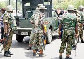 Image result for picture of nigerian soldiers on the streets