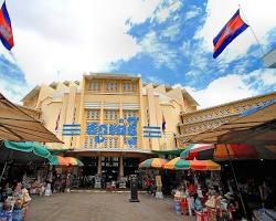 Image of bustling Central Market (Psar Thmei) in Phnom Penh, with its diverse array of goods and stalls