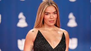 Karol G’s Workout Shorts & Oversized Reebok Pullover Are a Gym Staple