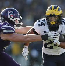 Michigan Wolverines Explore Running Back Options Amid Injuries