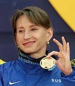 Olga Yegorova of Russia shows off her Gold medal, which she received for her first place ... - sports3