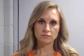 Pervy mayor’s kids told cops that they caught her romping with teen boy at boozy pool party