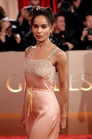 Zoë Kravitz brings lingerie to the Golden Globes red carpet in lacy nightgown dress