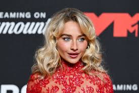 https://celebwell.com/sabrina-carpenter-poses-in-bikini-for-vogue-italia/