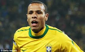 The boy from Brazil: Luis Fabiano has enjoyed a fine World Cup in South Africa so far for coach Dunga&#39;s men - article-1291318-0A1FFC8B000005DC-705_468x286