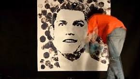 Cristiano Ronaldo and Lionel Messi painted using a football by Andrew Lenard | Mail Online - video-undefined-18DB60AC000005DC-391_290x163