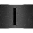 Electric cooktop with downdraft in