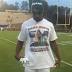 MiamiHurricanes players pay tribute to Artie Burns' mother before...