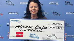 A graphic showing the Powerball logo and text indicating a $2 million win in Massachusetts.