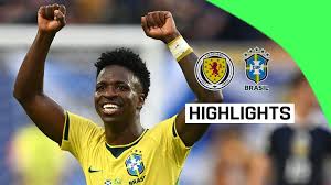Vinicius dazzles as Brazil cruises past Scotland to seal top spot