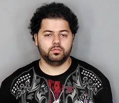 ... personal Facebook page. Burgos continued down this path of pure genius by also posting a video of himself walking into an unidentified NYPD station ... - ruben-burgos-mug-shot