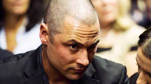 Carl Pistorius, brother of the famed Paralympian who allegedly beat and shot his girlfriend to death, is facing his own criminal charges of killing a woman. - Carl-Pistorius