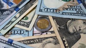 Peso mexicano se deprecia frente al dólar en un mercado atento a la visita de Trump a China
