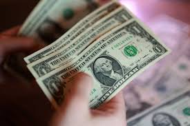 Wealthy families cut dollar exposure, survey finds