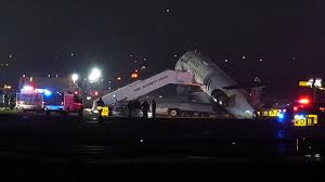 Pilot and copilot killed in collision between jet and fire truck at New York’s LaGuardia Airport