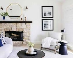 Image of living room with a fireplace as the focal point