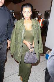 Resultado de imagem para famosas usando roupas militar vestido