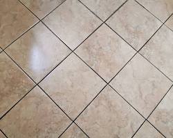 Image of closeups of various types of stone: marble slabs, porcelain tiles, travertine, and granite