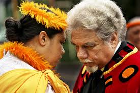 Kumu Snowbird Bento and Bill Souza, who carries the title of Alii Ai Moku O Hawaii, shared a moment just before the procession started yesterday. - artp3x