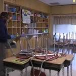  Video: Crews sanitize schools to fight flu while students are out