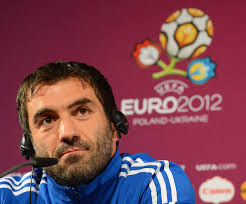 In this handout image provided by UEFA, Greece captain Giorgos Karagounis talks to the media during a press conference ... - Giorgos%2BKaragounis%2BGreece%2BTraining%2BPress%2BConference%2BmWsIZbpFWyml