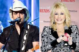 Dolly Parton and Brad Paisley during a country music tribute performance
