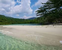 Pristine white sand beach and turquoise water on a Cambodian island