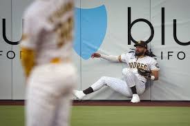 Tatis makes a leaping catch