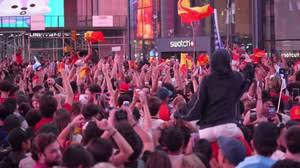 Licensable video: Spain fans take over Times Square after World Cup final victory
