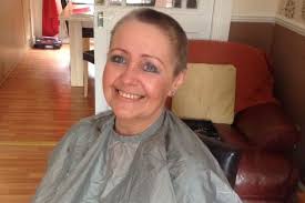 Elaine Ingram, from Bartley Green, has gone under the razor to help raise money and awareness for both St Mary&#39;s Hospice and the Roy Castle Lung Foundation. - JS36747382